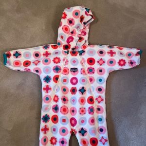 Patagonia 6 month fleece bunting with pink, red, blue on white background